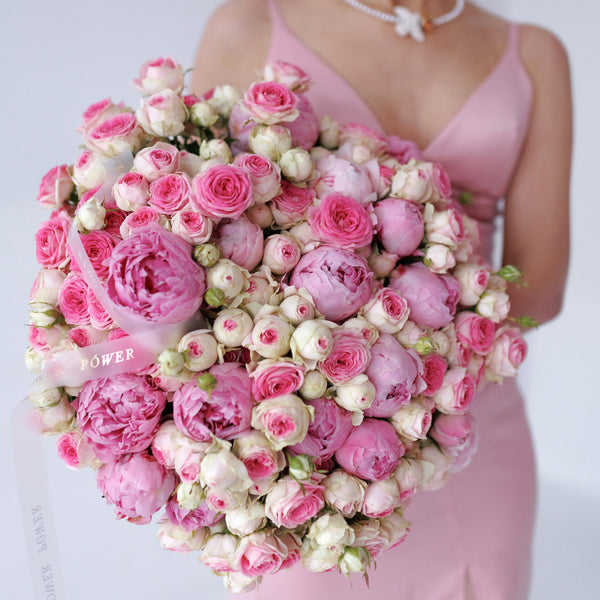 Bouquet of pink garden spray roses and peonies Scented Memories