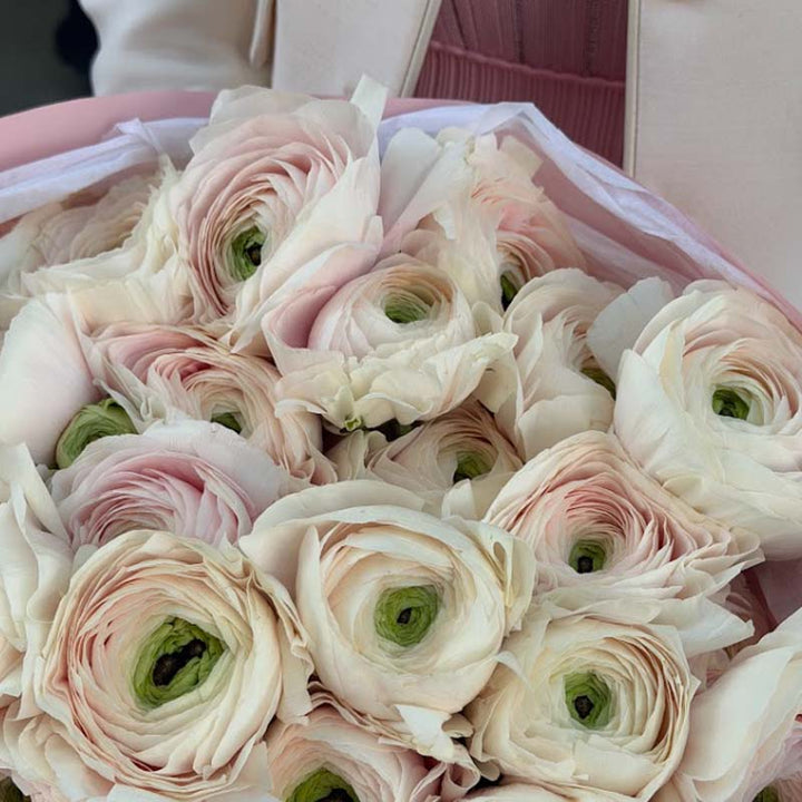 Bouquet of ivory ranunculus Blush Manor bouquet by Flower Power Dubai ...