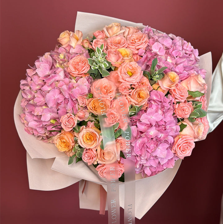 Fuchsia Paradise – bold rose arrangement in rich pink tones – romantic delivery by Flower Power