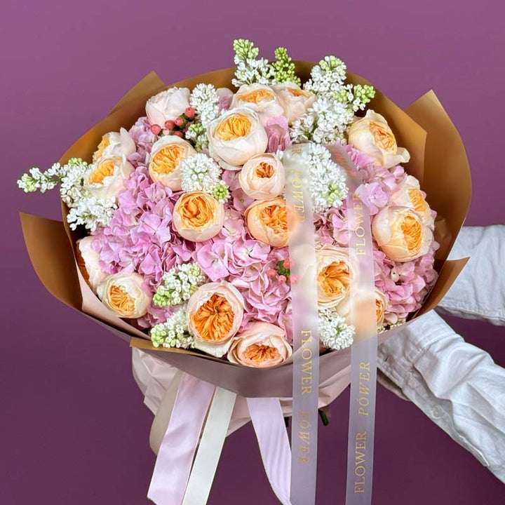 Coconut Bloom – delicate white floral arrangement for special moments – roses by Flower Power