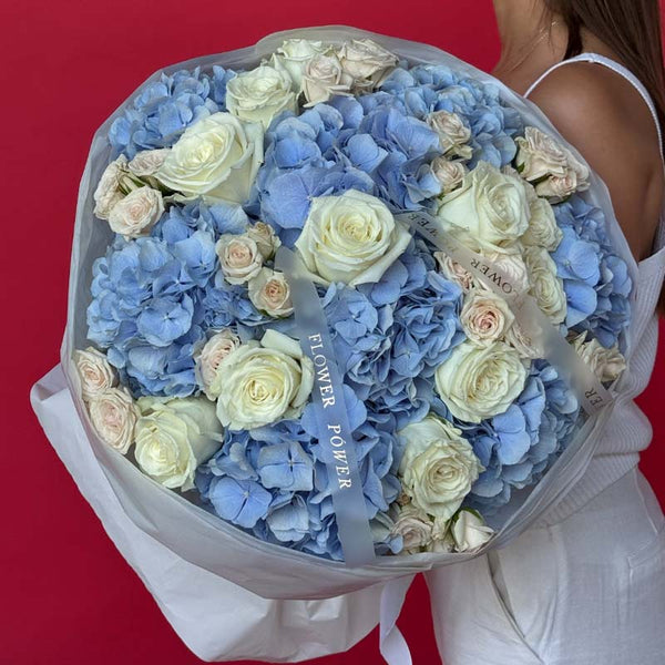 Bouquet of hydrangeas, roses and garden spray roses Blue Skies Forever