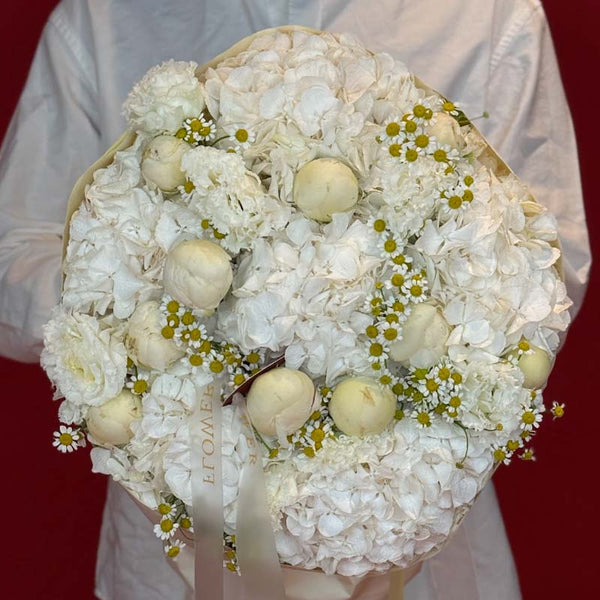 Bouquet of white hydrangeas, peonies and chamomile Chamomile Cloud