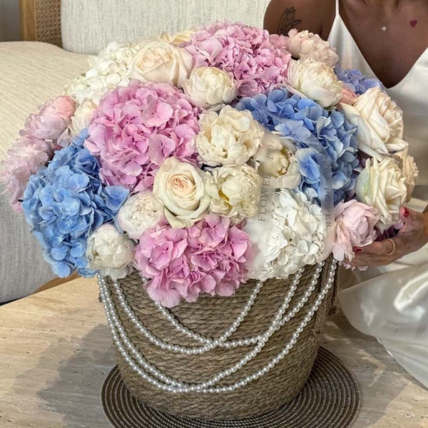 Basket of hydrangeas, peonies and roses Pastel Reverie