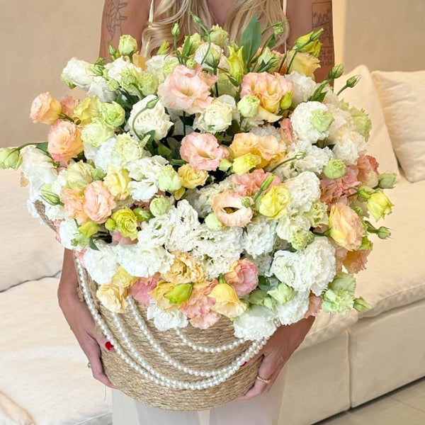 Basket of cream, blush, peach, and soft green eustomas Pastel Whisper