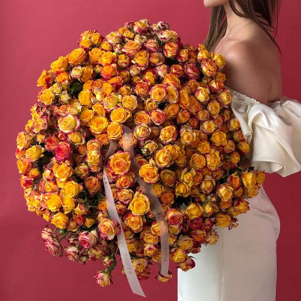Bouquet of yellow-orange garden spray roses Solar Kiss